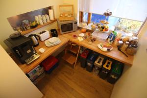 Eldhús eða eldhúskrókur á CJA Guesthouse