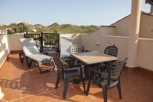 Balcon ou terrasse dans l'établissement Apartamentos Turisticos Aguilas de los Collados