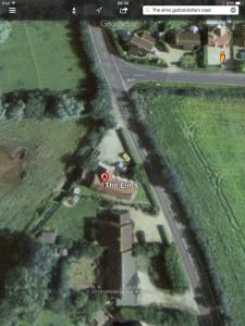 an aerial view of a building and a road at The Elms in East Harling