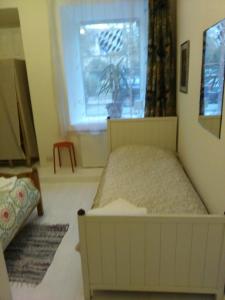 Cama ou camas em um quarto em Dora Apartment Užupis