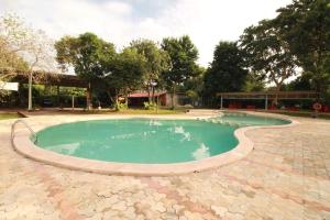 Bazén v ubytování Hotel Puuc nebo v jeho okolí