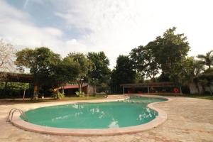 Bazén v ubytování Hotel Puuc nebo v jeho okolí