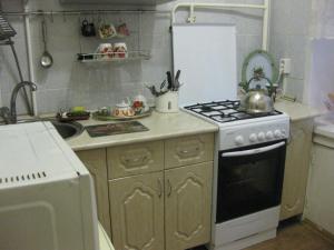 Кухня или мини-кухня в Apartment Bakunina 30а
