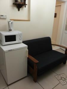A cozinha ou cozinha compacta de Dora Apartment Užupis