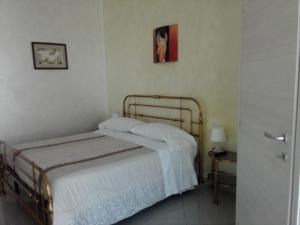Postel nebo postele na pokoji v ubytování Villa Ormeni