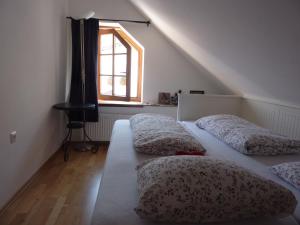 Кровать или кровати в номере Apartments Tabor43