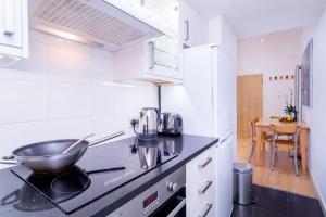 2 Bed 2 Bath Apartment Pimlicoにあるキッチンまたは簡易キッチン