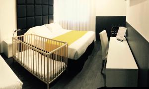 Postel nebo postele na pokoji v ubytování Hotel Pex Padova
