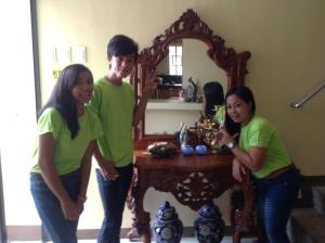 a group of people standing in front of a mirror at Danel Pensionne House in Tacloban