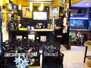 Posezení v ubytování Thaiphiphat house + 23 fotografií