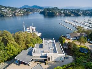 an aerial view of a house with a marina at Knudsen Apartment in Bergen