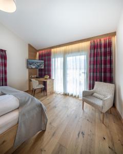Postel nebo postele na pokoji v ubytování Design Hotel Frauenschuh