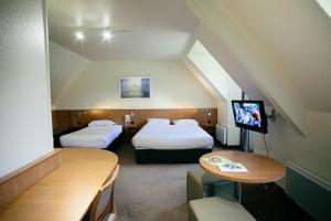 Postel nebo postele na pokoji v ubytování Hôtel Vert + 37 fotografií