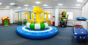 a childrens play room with at Green Park Hotel & SPA in Truskavets