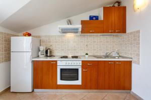 Kuchyň nebo kuchyňský kout v ubytování Apartments Baldigara by El-Pi Tours + 8 fotografií