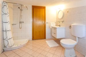Kylpyhuone majoituspaikassa Apartment Baldigara
