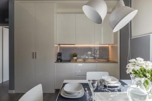 Kuchyňa alebo kuchynka v ubytovaní Matteotti Home Verona