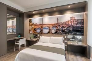 Posteľ alebo postele v izbe v ubytovaní Matteotti Home Verona