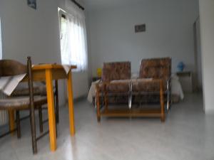 Posezení v ubytování Akácfa Hortenzia Apartman