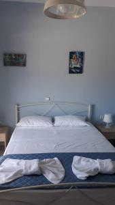 Postel nebo postele na pokoji v ubytování Olympic View Guesthouse