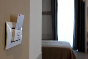 Posteľ alebo postele v izbe v ubytovaní Nuovo Albergo Operai
