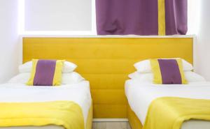 Katil atau katil-katil dalam bilik di Hotel Boutique Libris