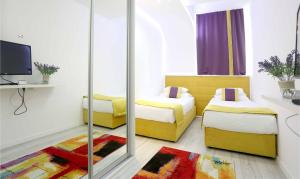 Televisyen dan/atau pusat hiburan di Hotel Boutique Libris