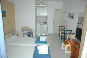 Kuchyň nebo kuchyňský kout v ubytování Portobelis Apartments