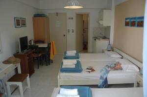 Postel nebo postele na pokoji v ubytování Portobelis Apartments