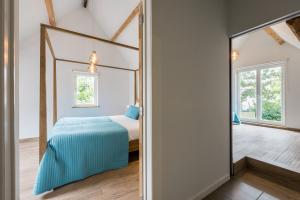 Postel nebo postele na pokoji v ubytování B&B visavis