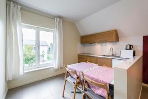 Kuchyň nebo kuchyňský kout v ubytování B&B visavis