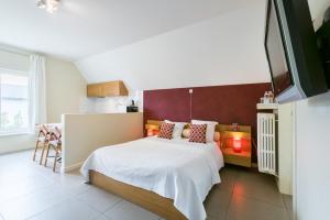 Postel nebo postele na pokoji v ubytování B&B visavis
