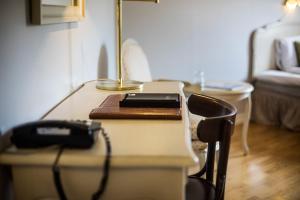 Voodi või voodid majutusasutuse First Hotel Olofström toas