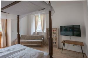 Un pat sau paturi într-o cameră la das-hornsteiner