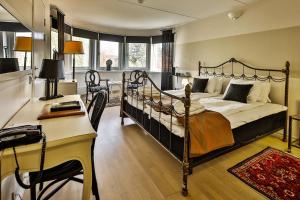 Postel nebo postele na pokoji v ubytování First Hotel Olofström + 37 fotografií