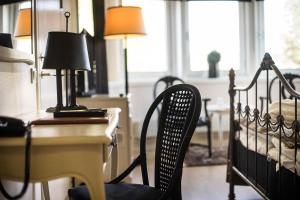 Voodi või voodid majutusasutuse First Hotel Olofström toas