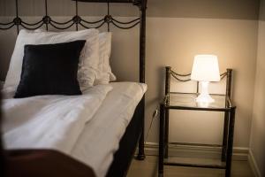 Voodi või voodid majutusasutuse First Hotel Olofström toas