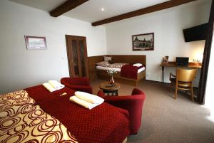 Posedenie v ubytovaní Apartments & Suites Žlutá Hruška
