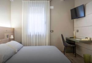 Postel nebo postele na pokoji v ubytování Accademia 21