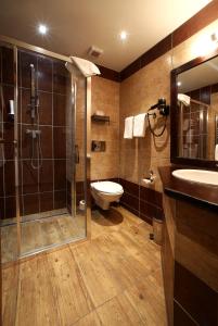 Kúpeľňa v ubytovaní Apartments & Suites Žlutá Hruška
