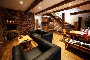 Posedenie v ubytovaní Apartments & Suites Žlutá Hruška