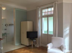TV a/nebo společenská místnost v ubytování Hotel Heidelberg Astoria
