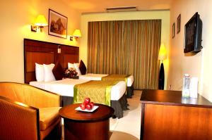 Ramada Katunayakeにあるベッド