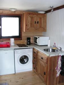 Una cocina o zona de cocina en Chalet L'ourson
