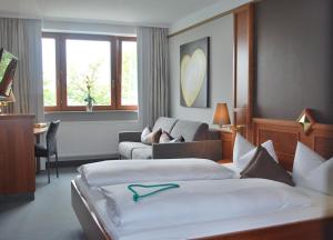 Postel nebo postele na pokoji v ubytování Berghotel Sammüller
