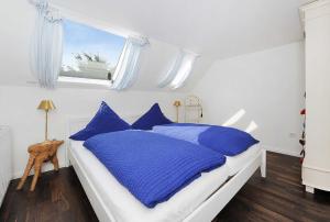 Ein Bett oder Betten in einem Zimmer der Unterkunft Landhaus Meer