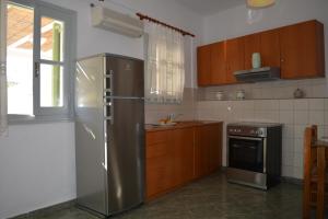 Kuchyň nebo kuchyňský kout v ubytování Klados Studios & Apartments