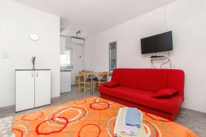 TV a/nebo společenská místnost v ubytování Apartments Na Obali Mora