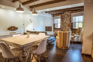 Posedenie v ubytovaní El celler de Cal Garriga