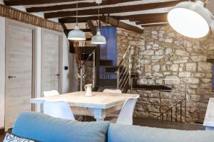 Posedenie v ubytovaní El celler de Cal Garriga